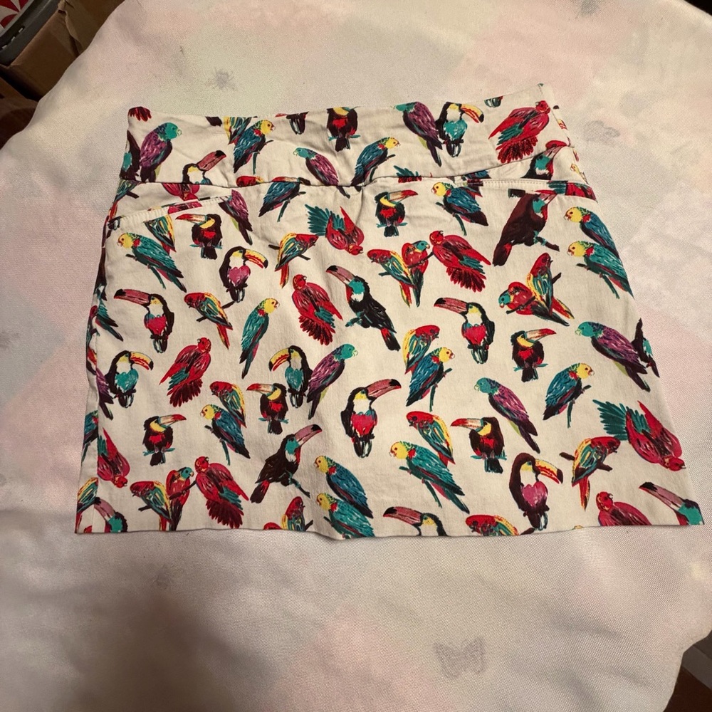 Attyre White Mini Skirt with Colorful Parrot Print